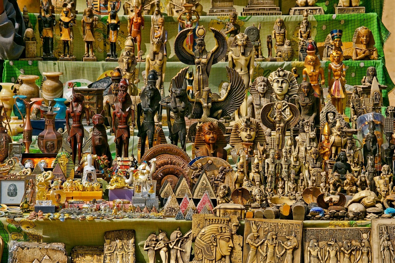 a large assortment of figurines on display in a store