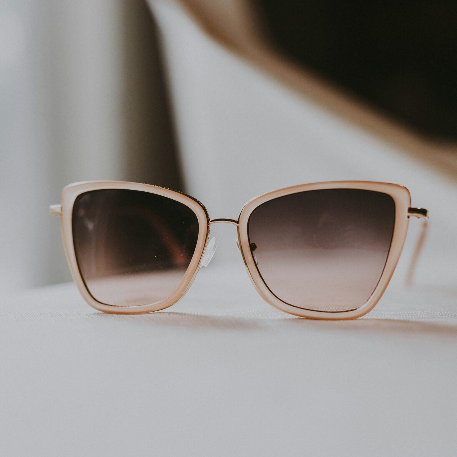 gray sunglasses with white frames